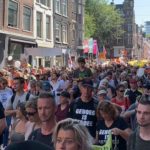 Enorme Mars Teen "Inentings Paspoorte" in Amsterdam Trek 100,000 Protesteerders van Regoor Politieke Spektrum!